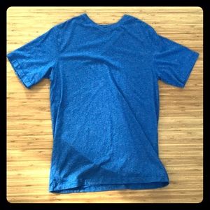 Blue t-shirt.